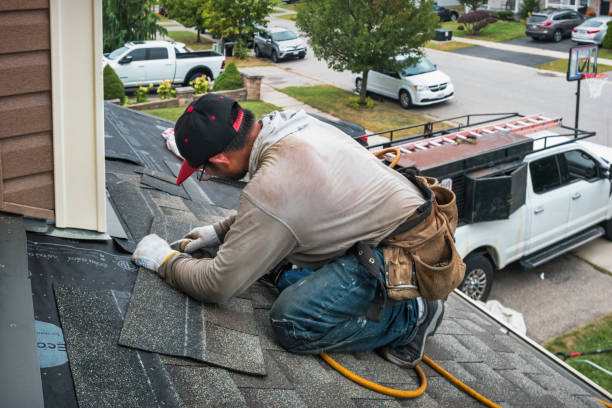 Professional Storm Damage Roof Repair technician working in Olivet, NJ